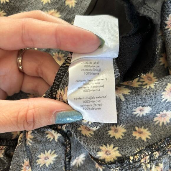 We Wore What Black Ditsy Daisy Yellow Floral Puff Sleeve Wrap Mini Dress Medium - Picture 6 of 7